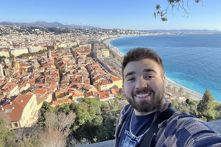 Man taking selfie in front of ocean